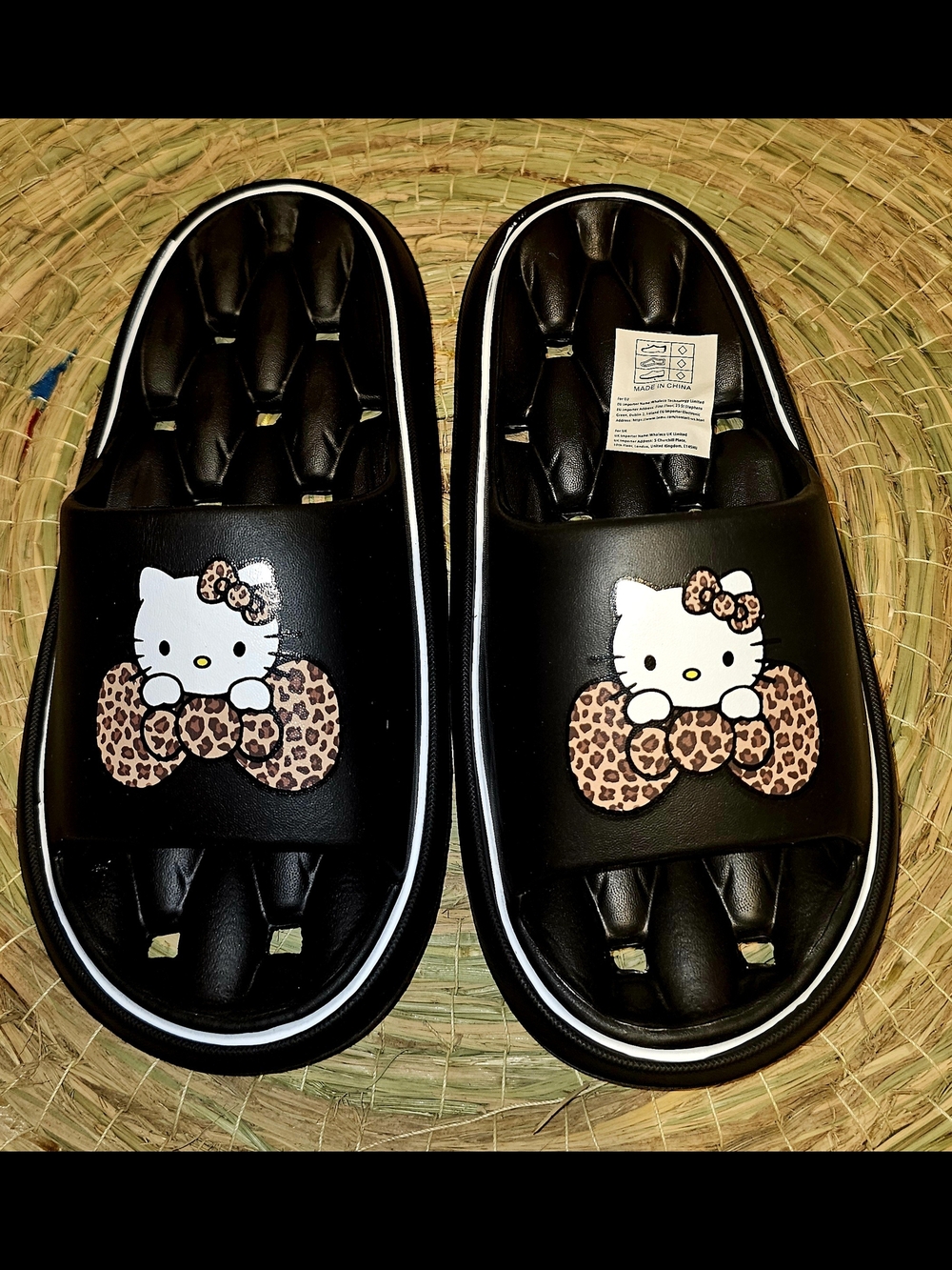 Hello Kitty Black Slide Sandals with Leopard Bow Design